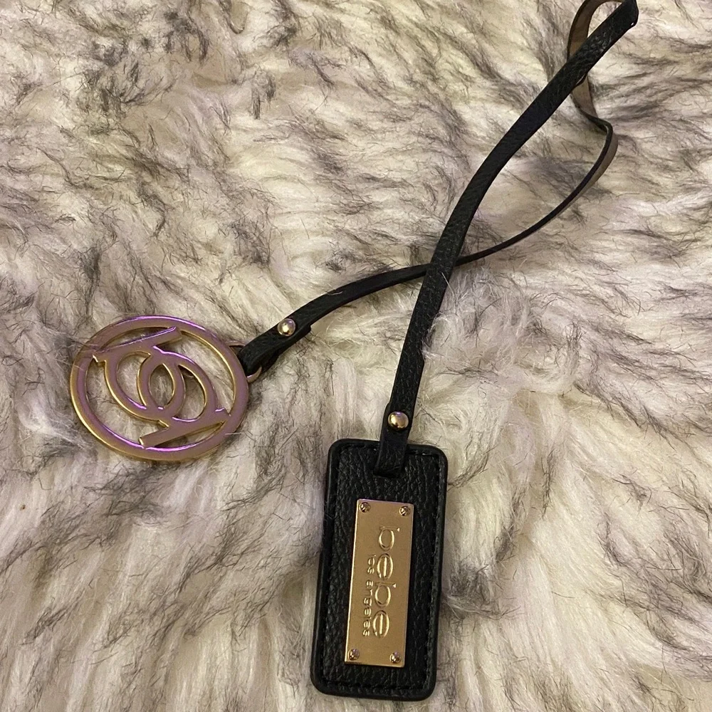 BEBE Black and Gold purse charm